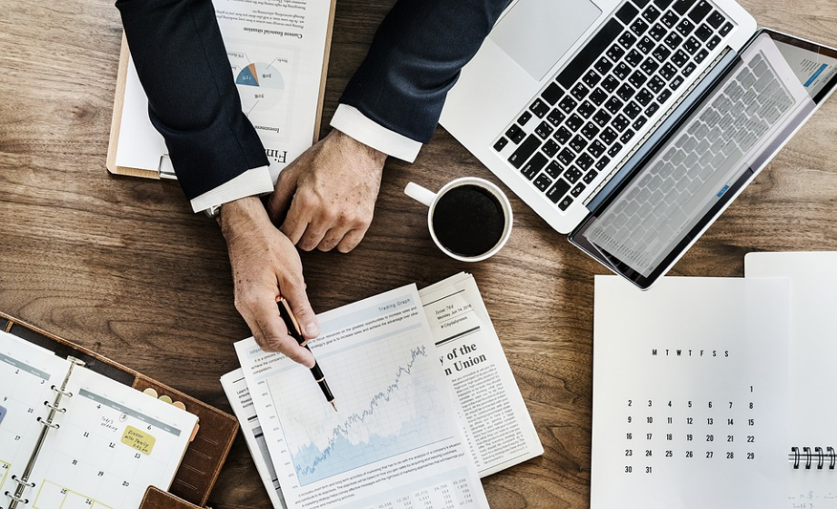 a person assessing business reports
